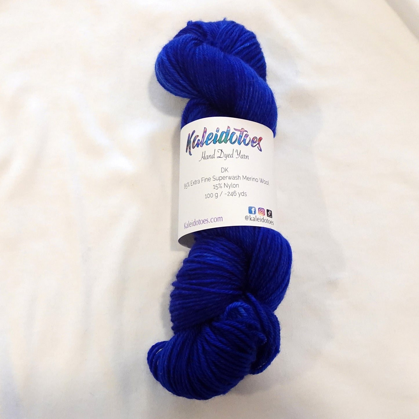 Hand-dyed DK weight yarn in deep royal lapis blue with subtle tonal variation — bold, rich, and regal.