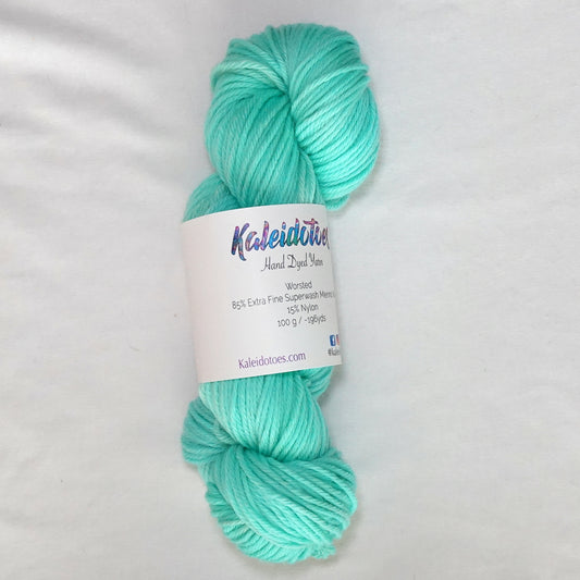 Hand-dyed worsted weight yarn in fresh mint and aqua tones - clean, cool, and luminous throughout.