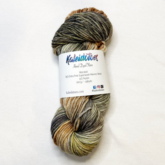 Hand-dyed yarn in soft neutrals, warm browns, and wintery greys inspired by cozy knitted mittens.