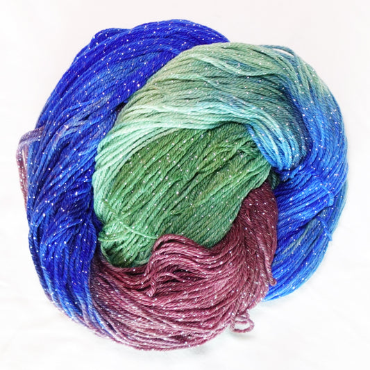 Long Weekend hand-dyed fingering weight yarn in saturated blue, layered greens and rich wine-plum with a fine silver metallic thread.