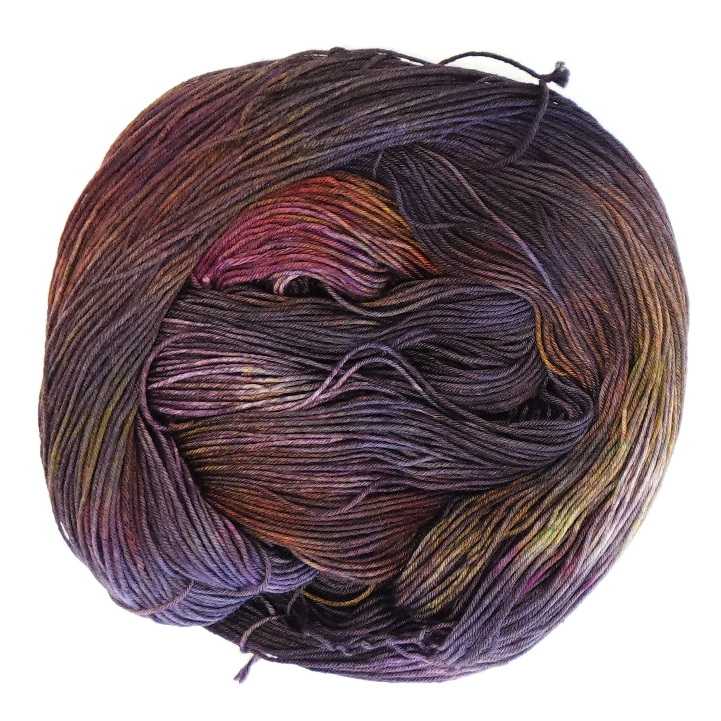 Hand-dyed fingering weight yarn in deep plum, smoky violet, rust, amber, and magenta with shadowy tonal depth throughout.
