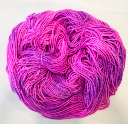 and-dyed yarn in vivid pink and orchid tones — playful and bright and candy-sweet.