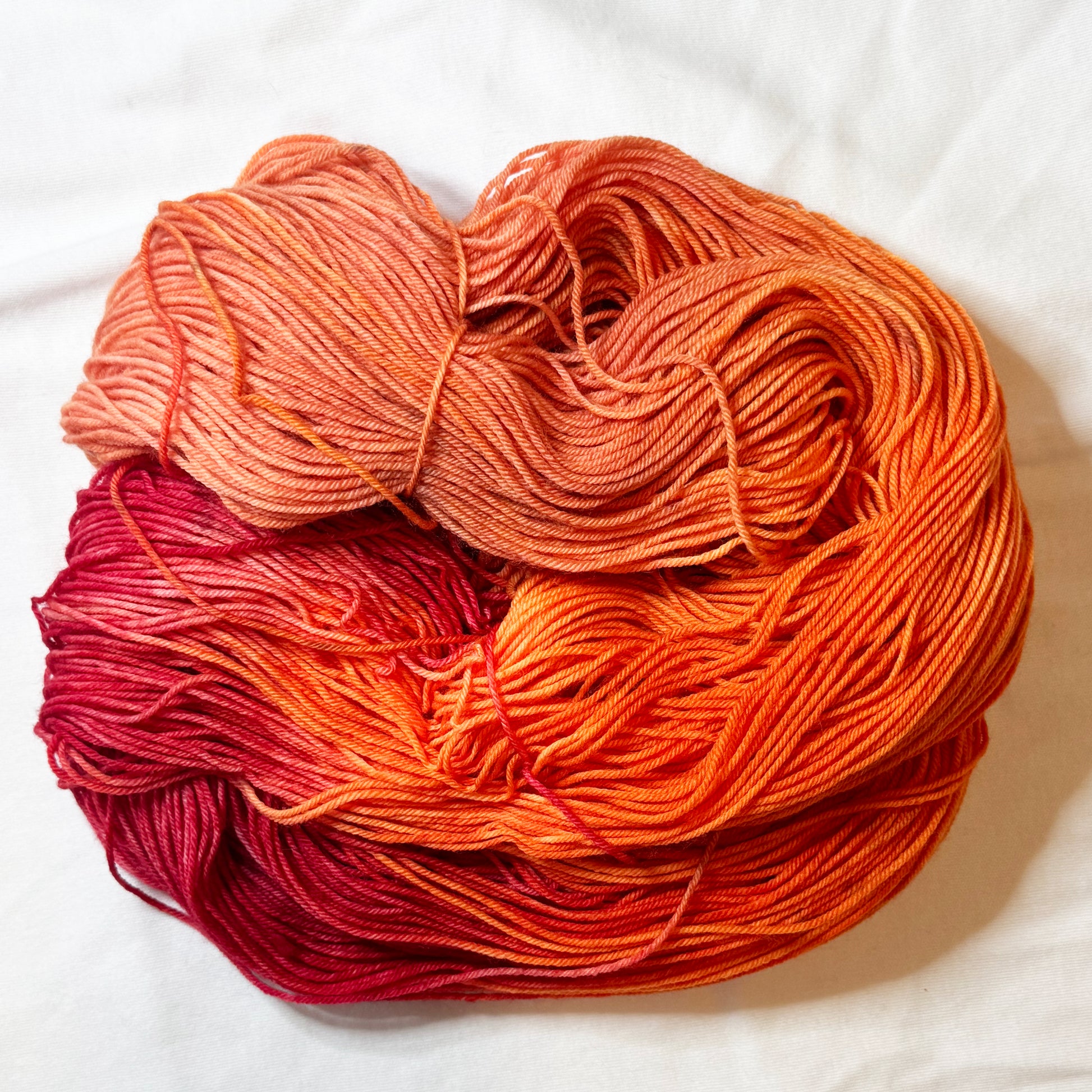hand dyed in oranges and reds
