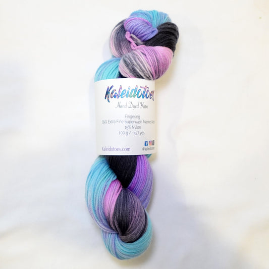 Hand-dyed yarn in vivid aqua, hot pink, and deep black — high-contrast and bold with a striking, graphic feel.