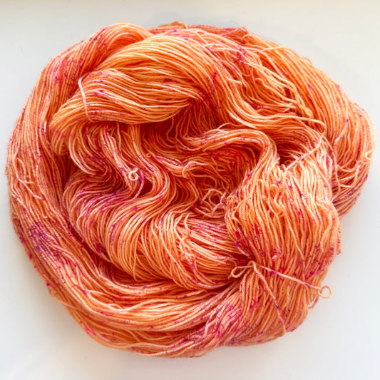 Fingering weight hand-dyed yarn, Peach Bellini, 75/25 superwash merino blend