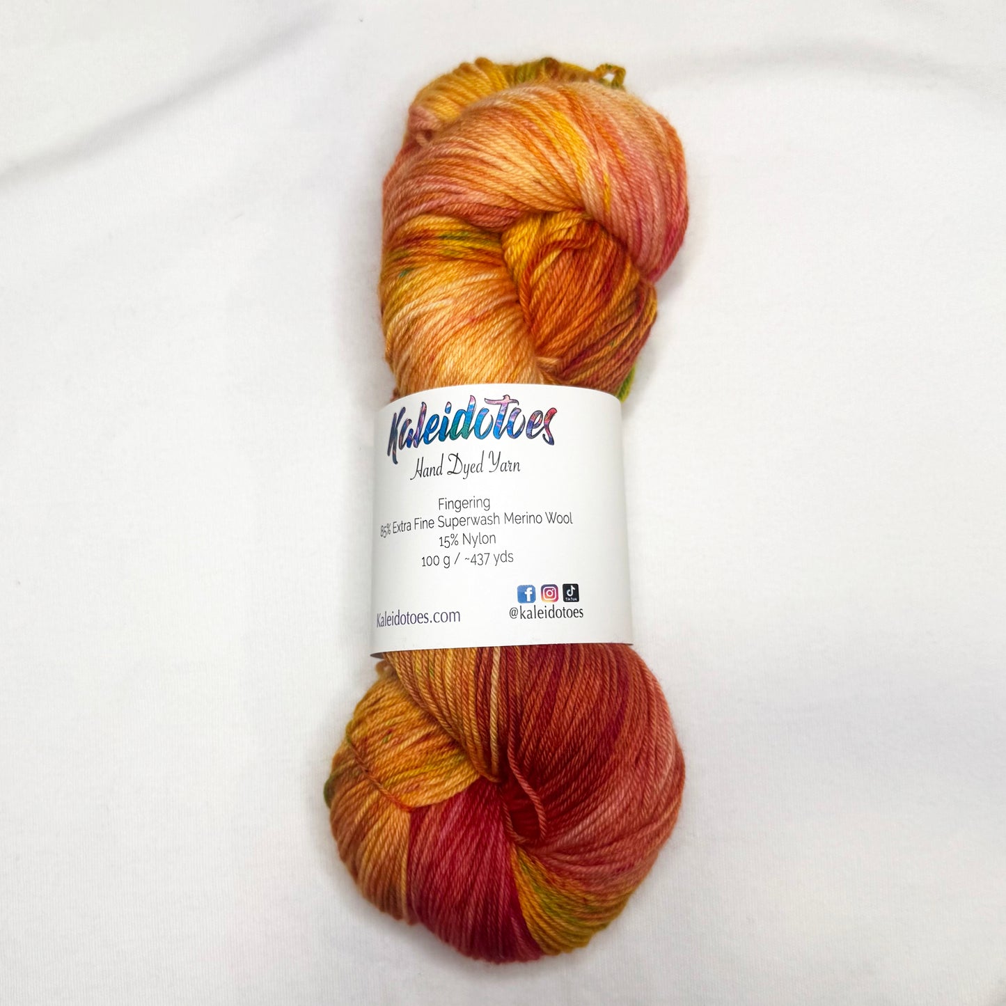 Hand-dyed yarn in amber, rust, and mossy green — inspired by autumn foliage and cozy fall adventures.