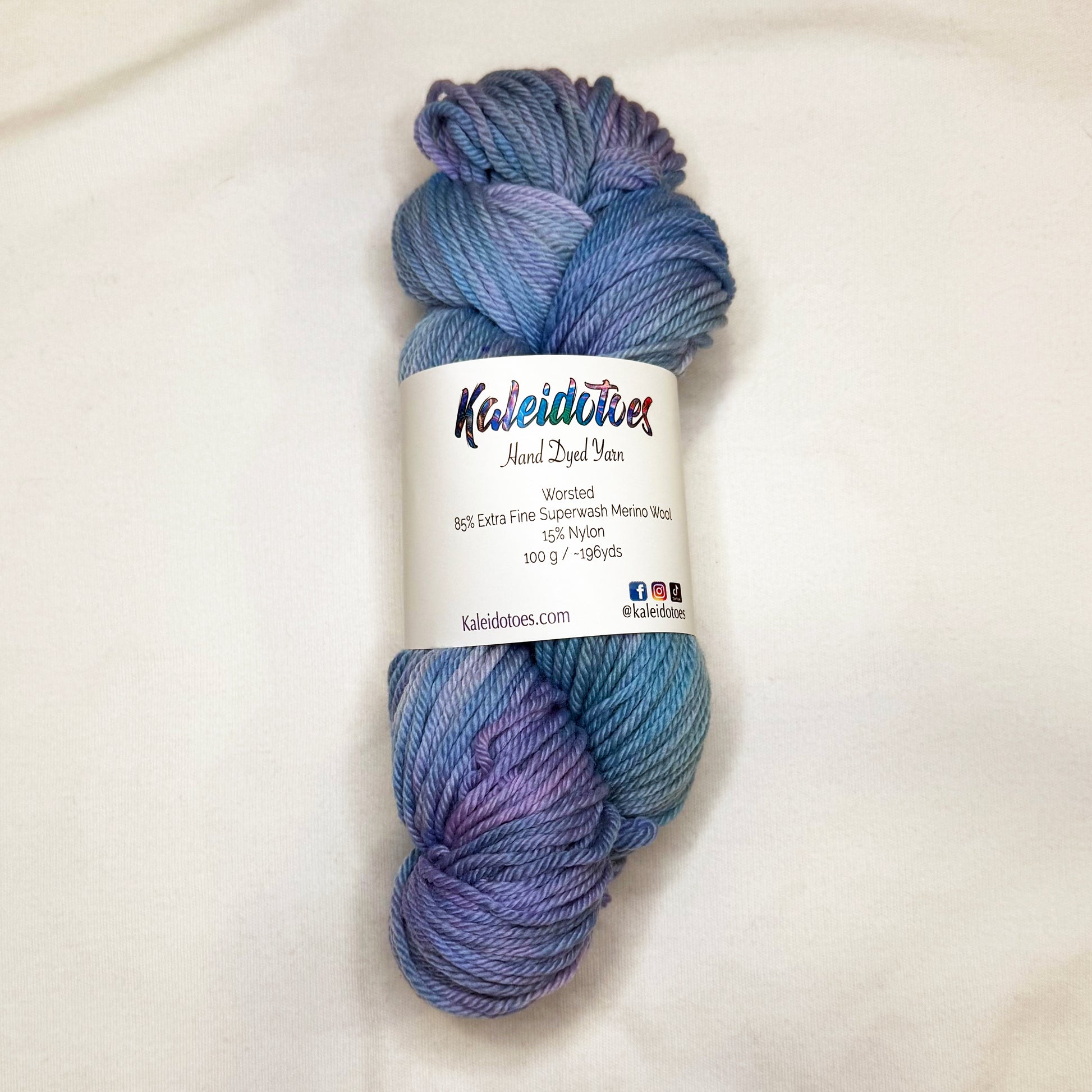 Hand-dyed yarn in soft periwinkle, lavender, and misty blue — tranquil and airy like a clear morning sky.