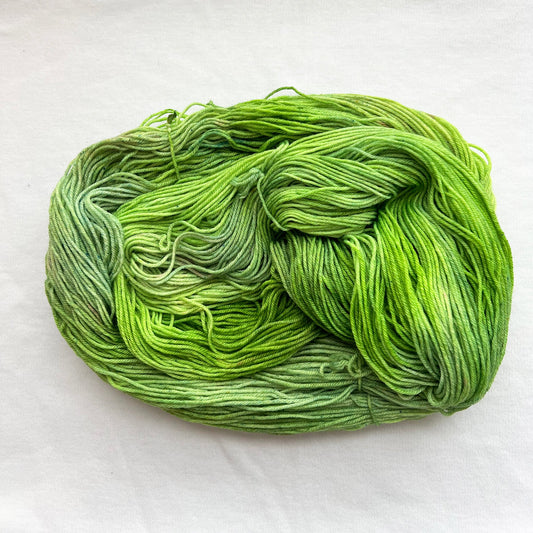 Indie dyed yarn skein, Touch Grass, bright and deep grassy green tones