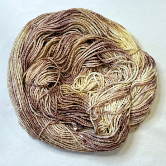 Hand-dyed yarn in soft grey, taupe, and birch-inspired woodland neutrals with a calm winter feel.